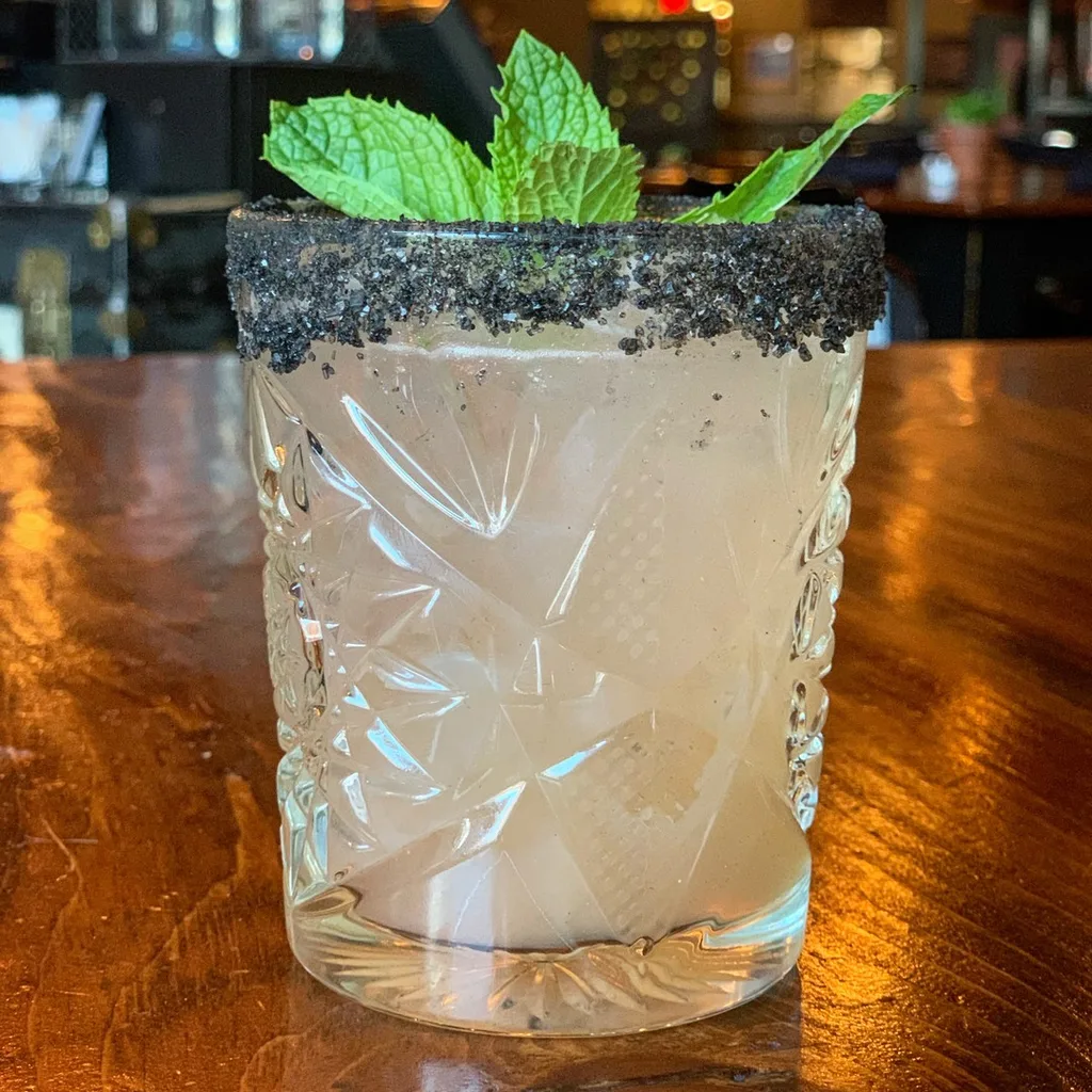 Handcrafted cocktail in a coupe glass