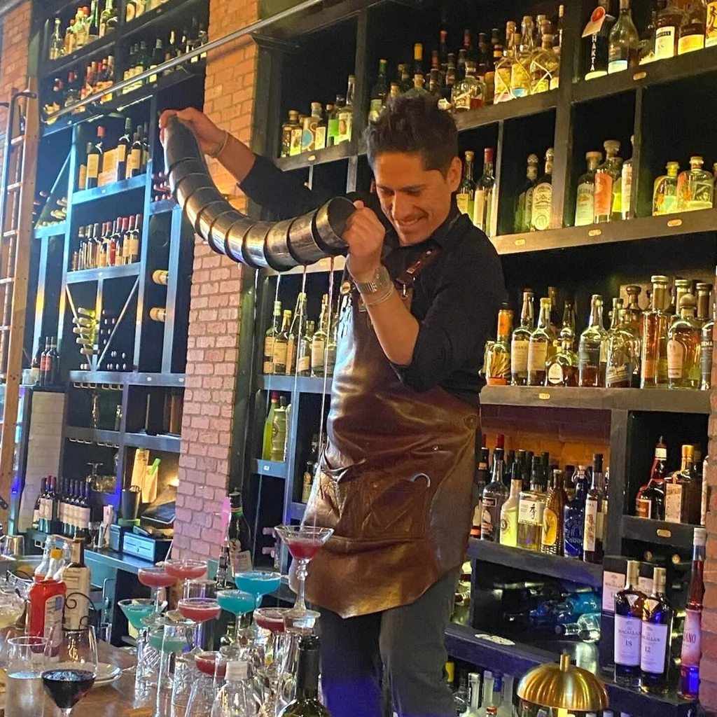 Guests enjoying wine at the bar
